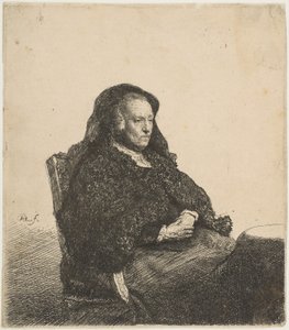 De Moeder van de Kunstenaar Zittend aan een Tafel, Kijkt Rechts: Driekwart Lengte door Rembrandt van Rijn
