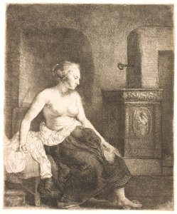 Vrouw die half aangekleed naast een kachel zit door Rembrandt van Rijn