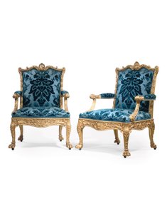Een paar George III vergulde houten armstoelen
