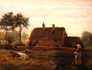 Vee grazend bij een rieten huisje bij zonsondergang