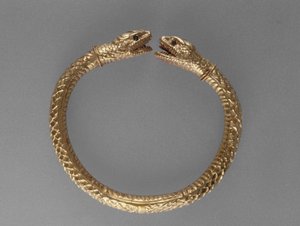 Slangenarmband, AD 1-100 (goud met groene glazen ogen)