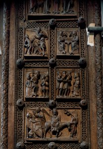 Romaans kunst: houten deur uit het midden van de 12e eeuw van de Kerk van St. Maria van het Kapitool in Keulen, Duitsland (Sankt Maria im Kapitol, Keulen). Scènes die de aankondiging aan de herders, de geboorte, de aanbidding van de wijzen en de door Romanesque