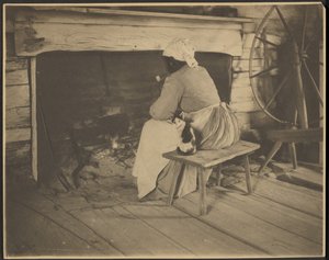 [Vrouw bij de haard]. door Rudolf Eickemeyer, Jr.
