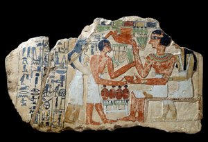 Egyptische oudheid: Iri stèle in kalksteen. Een paar dat een offer brengt. Eerste tussenperiode (2200-2033 v.Chr.) Zon. 0,3x0,52 m Parijs, Louvre museum