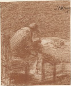 Schrijvende man aan een tafel