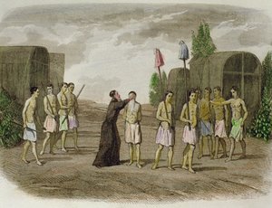 Een inheemse slaaf van de Tupinamba-stam wordt gedoopt door een Jezuïetenpriester, nabij Bahia in 1550 door Spanish School