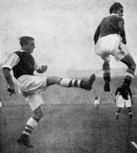 Actie uit een Arsenal v Chelsea voetbalwedstrijd