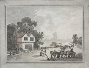 Paarden en karren op een landweggetje