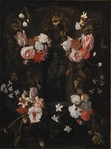 Een stenen cartouche met de Maagd Maria en het Christuskind in een nis omringd door een bloemenkrans