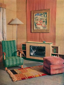 Een zitkamer met een schilderij van J.D. Fergusson boven de open haard, 1935 door Unbekannt