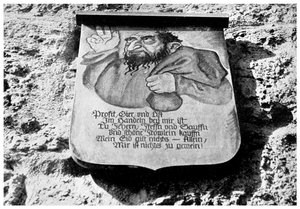 Antisemitisme: middeleeuwse inscriptie op de stadsmuur, Rothenburg, Duitsland