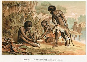 Australische inboorlingen bereiden maaltijd van een dier dat ze hebben gejaagd
