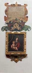 Kerk. Interieur. Schilderij Madonna met het kind, olieverf op doek. Een muurschildering de legende (leyenda sobre Nuestra Señora del Patrocinio) door Unbekannt