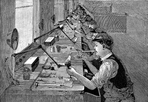 Soldeerwerk aan fietsonderdelen in een Amerikaanse fabriek, ca. 1900