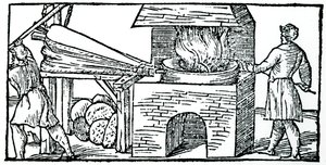 Balg gebruiken om de trek in een oven te vergroten, 1540 door Unbekannt