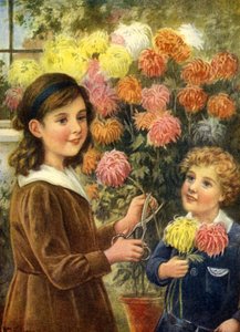 Jongen en meisje die bloemen knippen in de tuin buiten hun huis