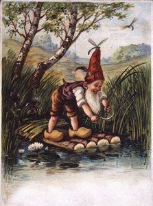 Dwerg snijdt uit het riet bij een vijver