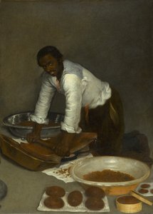 Een man die chocolade schraapt