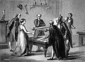 Luigi Galvani, professor in Bologna, ontdekte in 1780 de prikkelbaarheid van de spieren van de kikker door elektriciteit. Gravure uit de 19e eeuw.