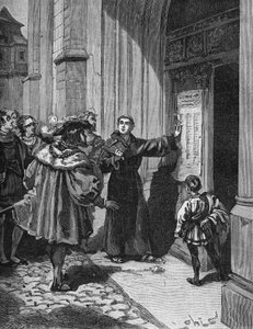 Maarten Luther (1483-1546) hangt zijn 95 stellingen in Wittenberg op