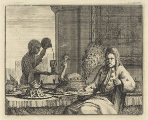 Man bij een gedekte tafel