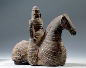 Chinese kunst: beeldje van ruiter in harnas (206 v.Chr.-220 n.Chr.), Han-periode. Parijs, Musee Cernuschi door Western Han Dynasty Chinese School