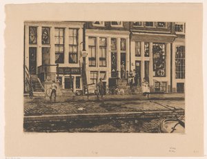 Gezicht op huizen aan de Oude Waal in Amsterdam