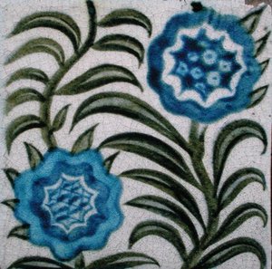 Tegel met gestileerde bloemen door William de Morgan