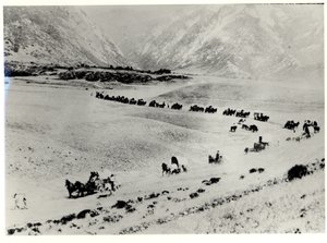 Pioniers die immigranten van het treinstation ophalen en naar de Mormoonse Salt Lake City leiden door William Henry Jackson