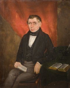 Portret van een zittende man