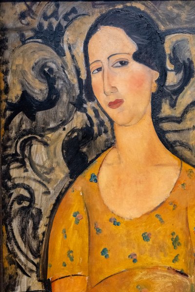 Jonge vrouw in gele jurk (Renée Modot)-uitsnede door Amedeo Modigliani