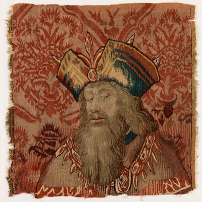 Tapijtpaneel met het hoofd van een priester of koning, mogelijk gemaakt in Doornik, België, mogelijk begin 16e eeuw (wol) door Belgian School