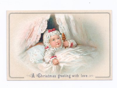 Een Victoriaanse kerstkaart van een kind in bed met een rammelaar, ca. 1880 door English School