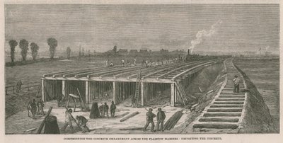 Aanleg van de betonnen dijk over de Plaistow moerassen door English School