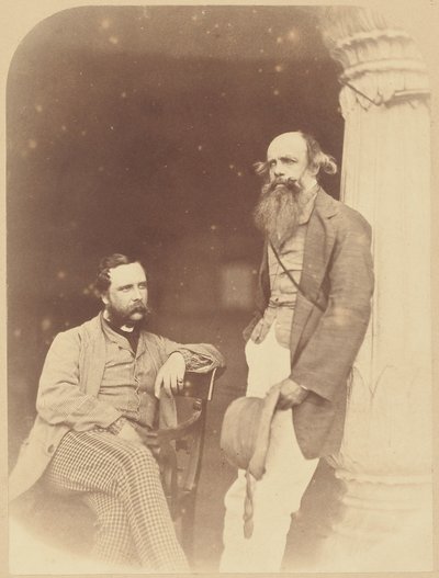 [Portret van twee Europese mannen, één zittend, één staand]. door Felice Beato