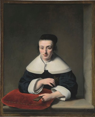 Portret van een dame bij een raam door Ferdinand Bol