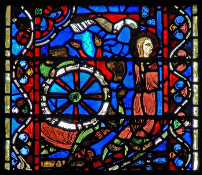 Raam w53 met afbeelding van een scène uit het leven van St. Catharina: de beulen bereiden het wiel voor haar beproeving voor door French School