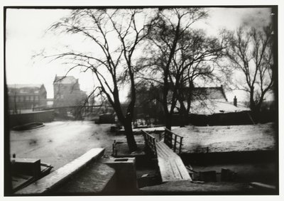 Wintergezicht over de Amstel in Amsterdam door George Hendrik Breitner