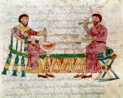 Twee mannen aan tafel tijdens een maaltijd uit het volume 