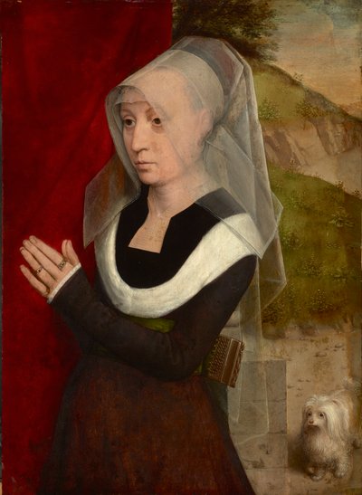 Biddende vrouw met haar hond door Hans Memling
