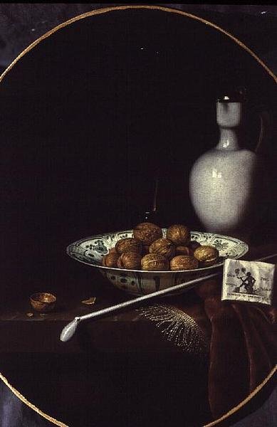 Stilleven met Walnoten, Tabak en een Kleipijp door Hubert van Ravesteyn
