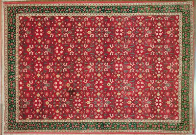 Mughal tapijt met een bloesem- en rasterontwerp, Noord-Indiaas door Indian School
