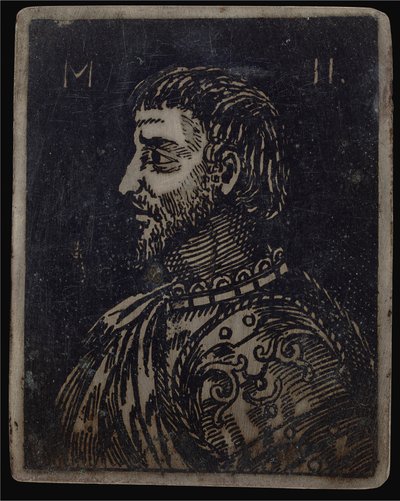 Borstbeeld van een bebaarde man met sierlijk borstplaat naar links door Italian 16th Century
