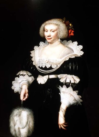 Portret van een dame in een zwarte jurk met kanten kraag en manchetten door Jan Anthonisz. van Ravesteyn