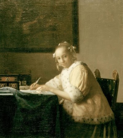 Briefschrijfster in geel door Jan Vermeer van Delft