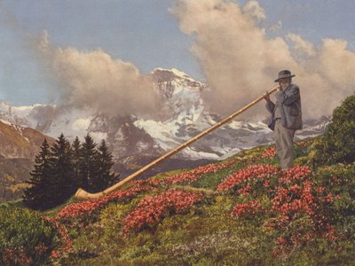 Zwitserland: Een Alphornblazer, de Jungfrau op de achtergrond door Jean Gaberell