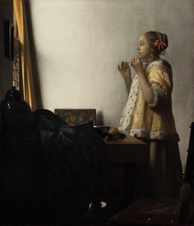 Jonge vrouw met parelketting door Johannes Vermeer