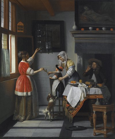 Interieur met een kind dat een papegaai voedt door Pieter de Hooch