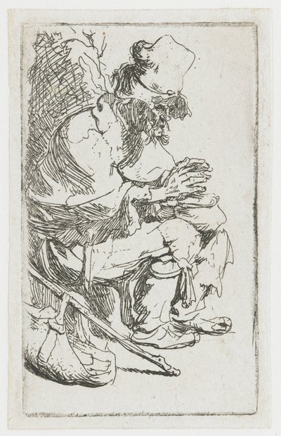 Een bedelaar die zijn handen warmt door Rembrandt van Rijn