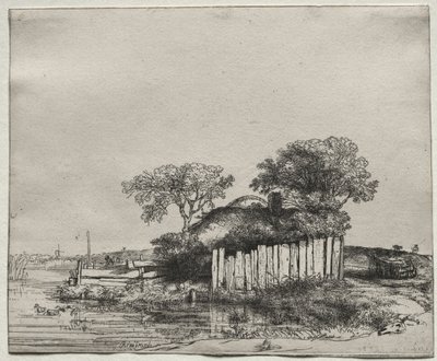 Cottage met een witte omheining door Rembrandt van Rijn